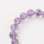 Mystical Realm of Purple Glow-Beaded Bracelet