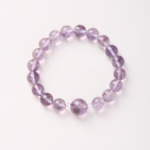 Mystical Realm of Purple Glow-Beaded Bracelet